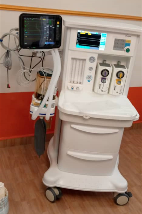 MeCanMed technician performing safety pressure tests and gas leak checks on a new Anesthesia Machine.