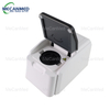 MECANMED Dry Chemistry analyzer with open lid, sample tray, and radiation warning symbol.