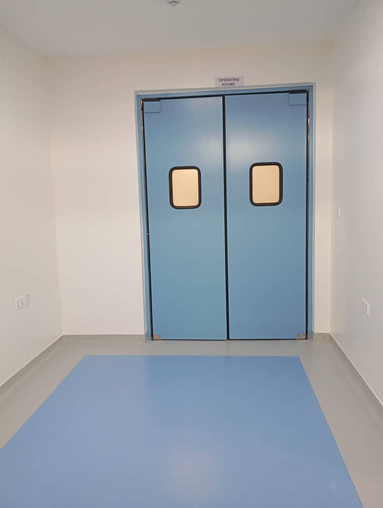 High-performance medical-grade PVC flooring installed by MeCanMed in a Rwanda hospital operating room.