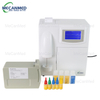 The MECANMED MCL2259 Electrolyte Analyzer with a reagent pack and vials of colored reagents on a clean background.