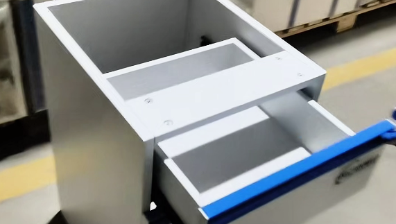 MeCanMed’s inspector performing meticulous visual inspection on lab bench.