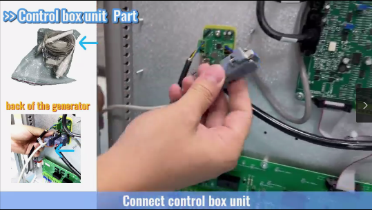 Technician connecting control box unit to circuit board during X-ray machine installation
